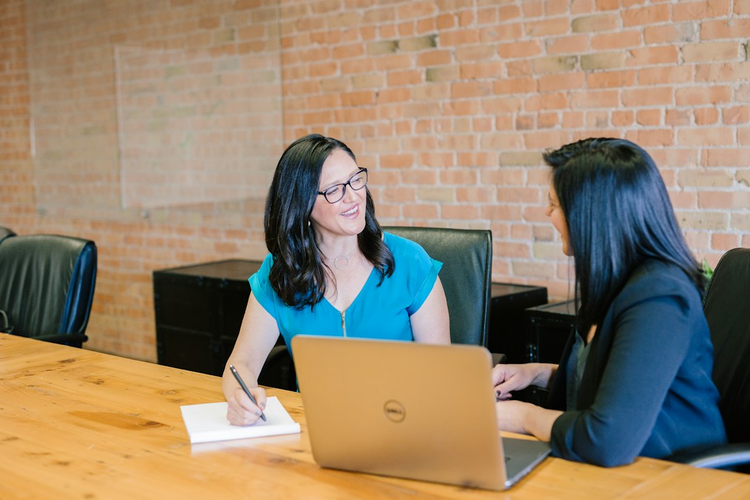 Two business owners discussing a customer growth plan